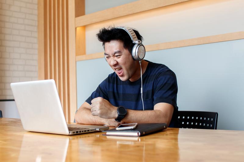 Man Excited at Computer